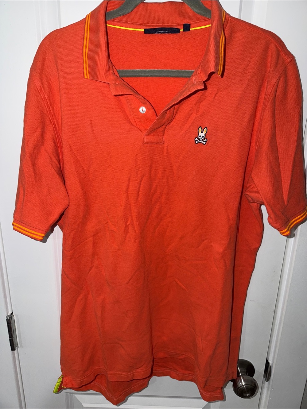 Psycho Bunny Orange Polo with Yellow Trim